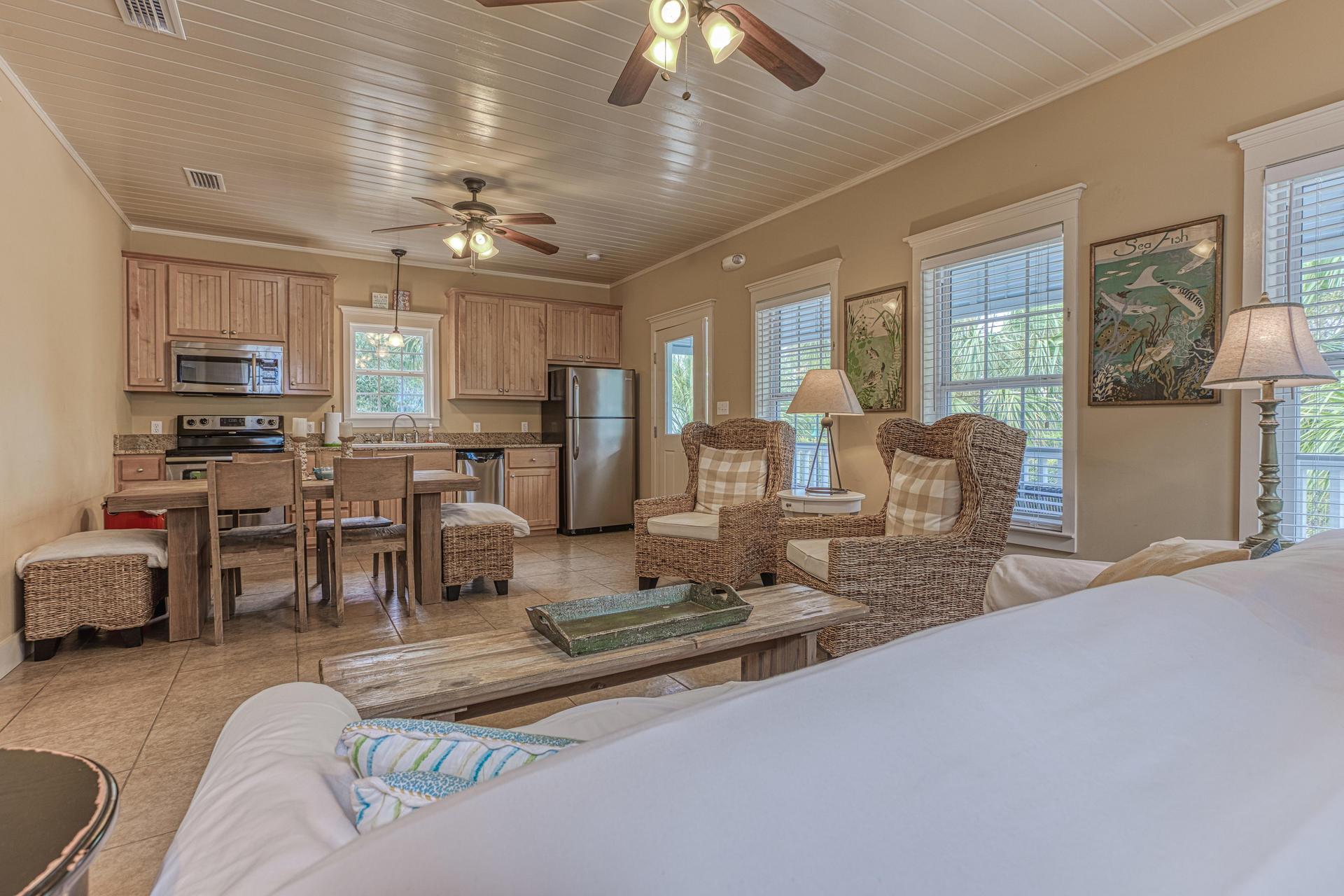 18 Draper Lane Santa Rosa Beach, FL 32459 - Photo 38 of 63 a living room with furniture a dining table and kitchen view