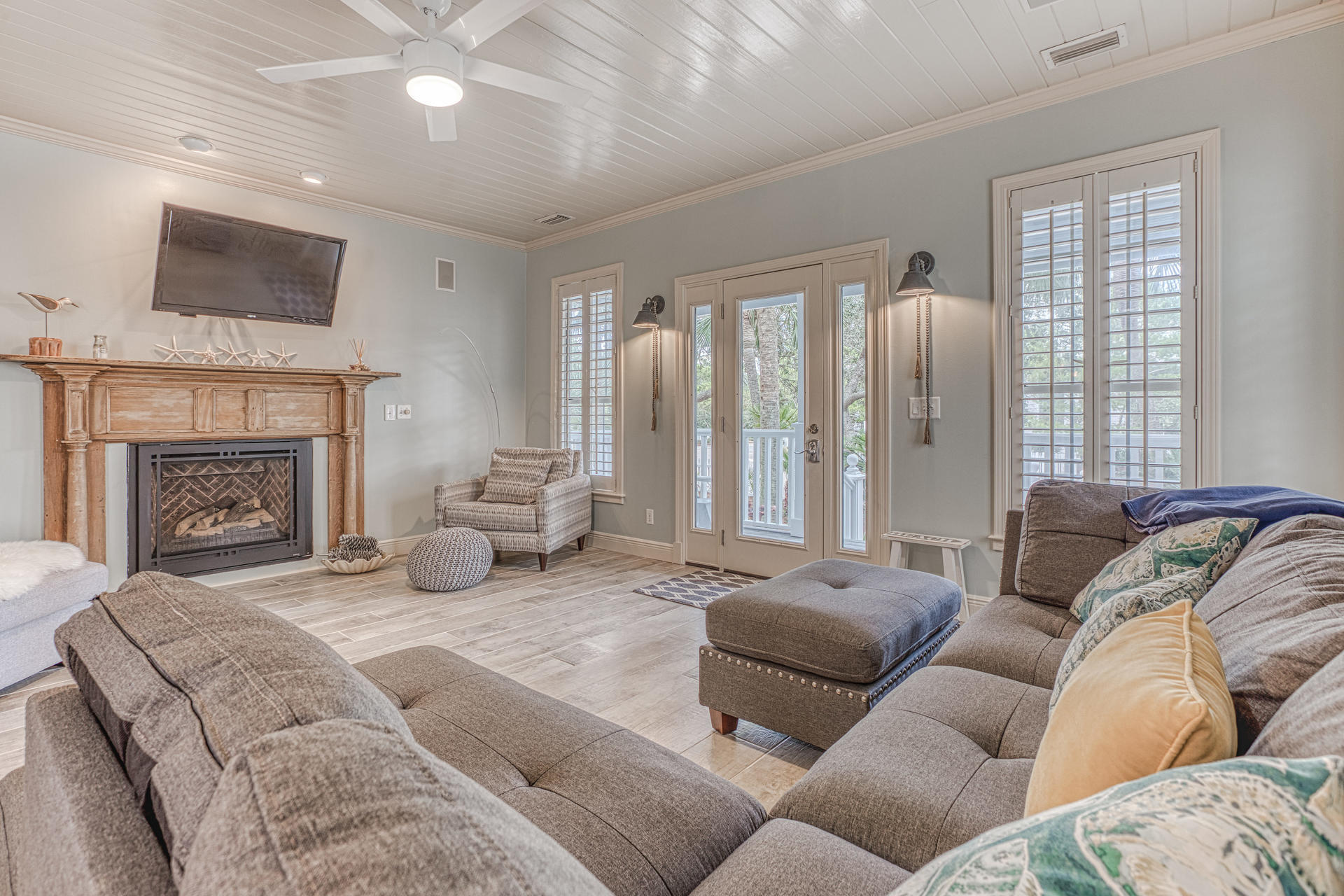 18 Draper Lane Santa Rosa Beach, FL 32459 - Photo 5 of 63 a living room with furniture fireplace and a flat screen tv