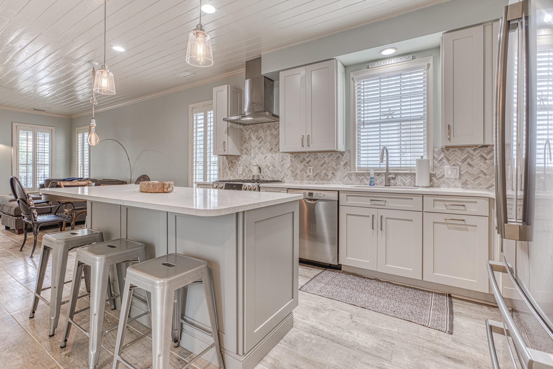 18 Draper Lane Santa Rosa Beach, FL 32459 - Photo 10 of 63 a kitchen with a sink window and cabinets