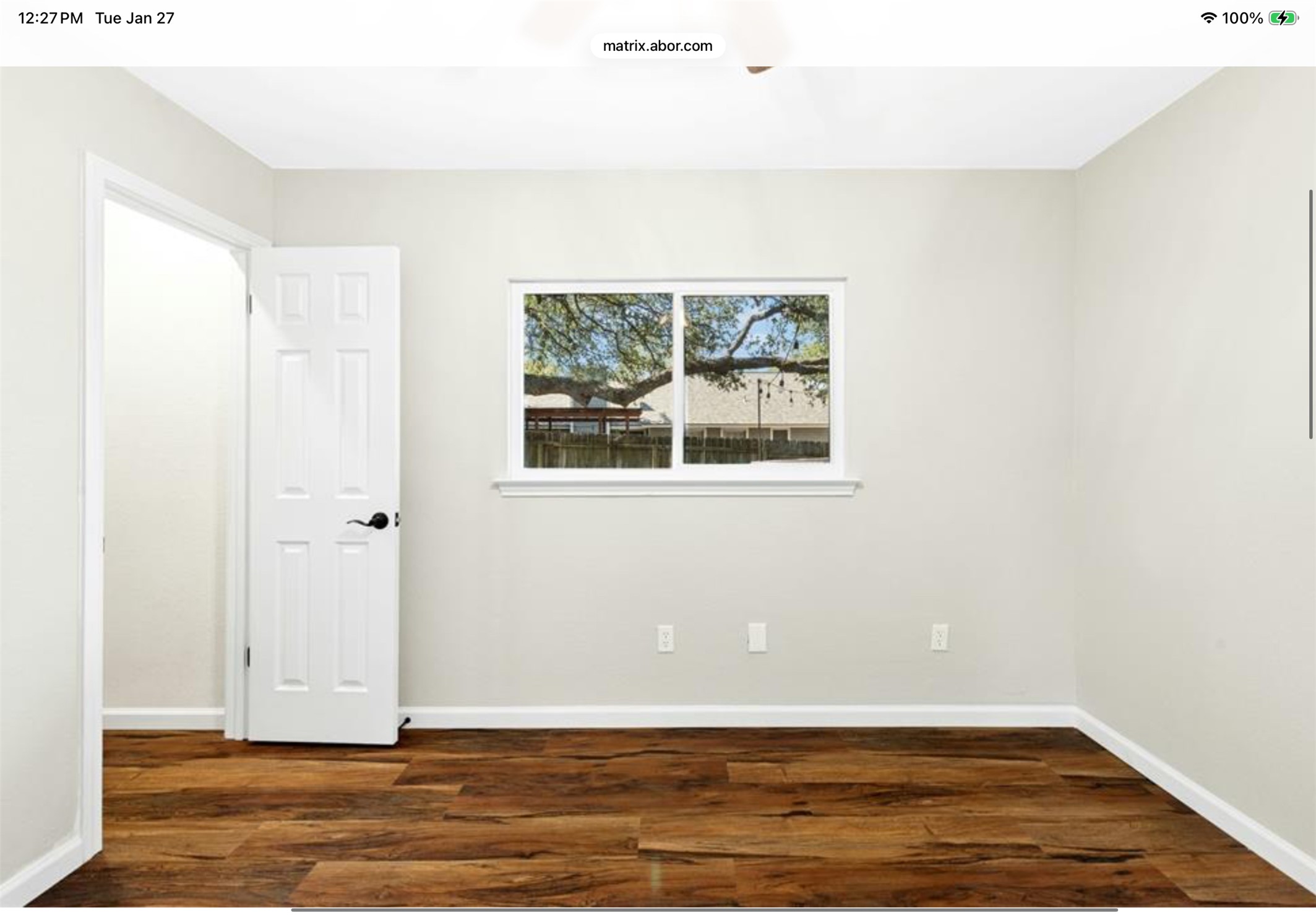 12904 Garfield Lane Austin, TX 78727 - Photo 24 of 31 Spare 3rd bedroom with LVP wood finished floors, new ceiling fan/light combo, fresh paint, new baseboards and walk-in lighted closet.