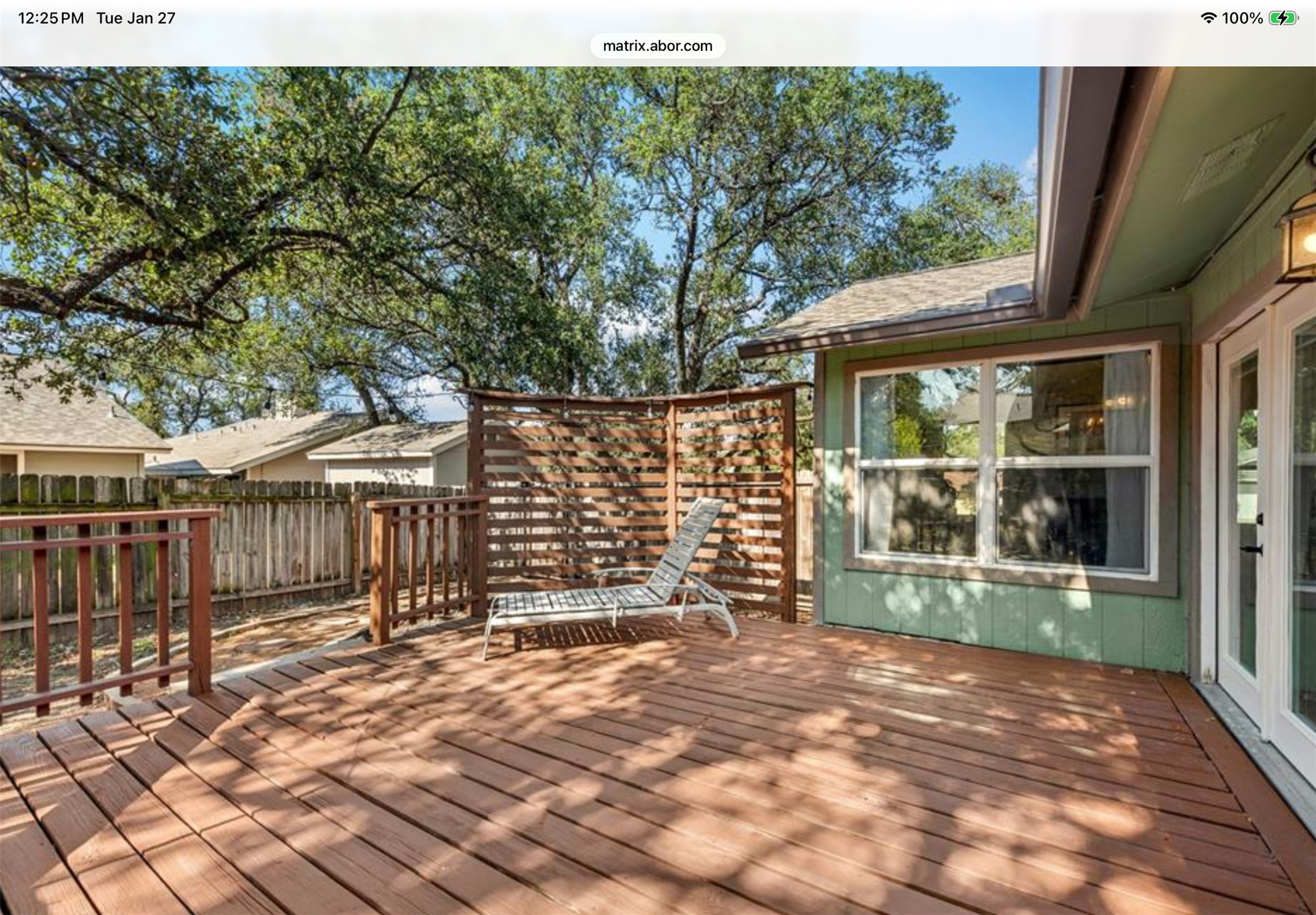 12904 Garfield Lane Austin, TX 78727 - Photo 29 of 31 View of freshly stained wooden deck and deck rails. The windows are to the living room.