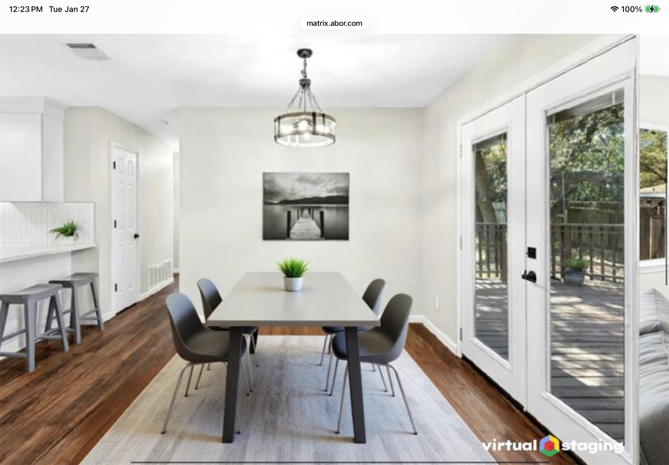 12904 Garfield Lane Austin, TX 78727 - Photo 4 of 31 Dining room featuring dark wood-type flooring, french doors, and hanging lights