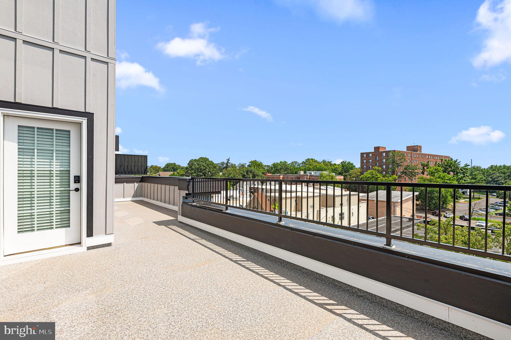 26 South York Road, Unit 409 Hatboro, PA 19040 - Photo 13 of 16 Spacious rooftop retreat with skyline views.