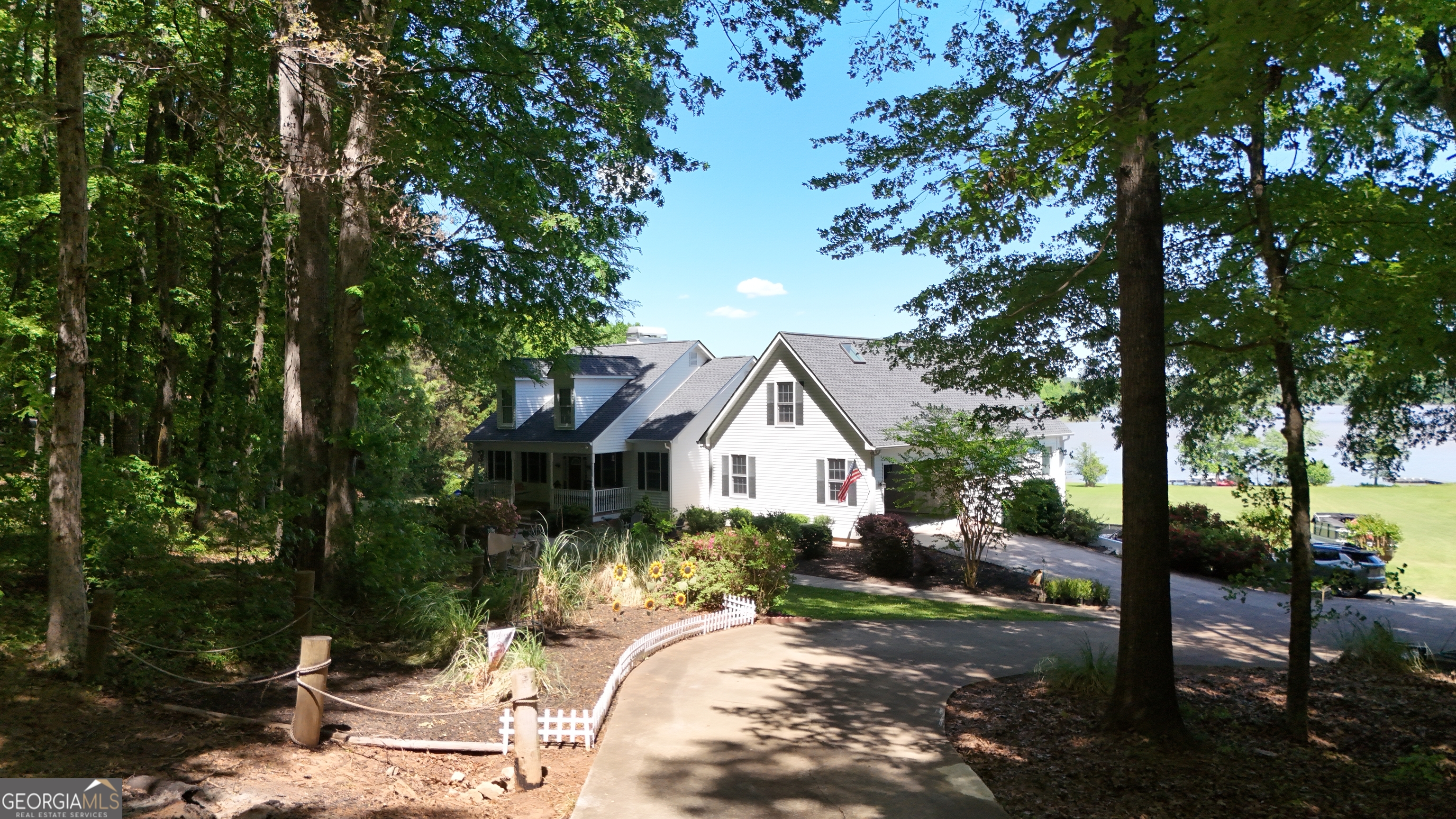 1051 Oconee Farms Road Greensboro, GA 30642 - Photo 19 of 23 a view of a house with backyard and sitting area