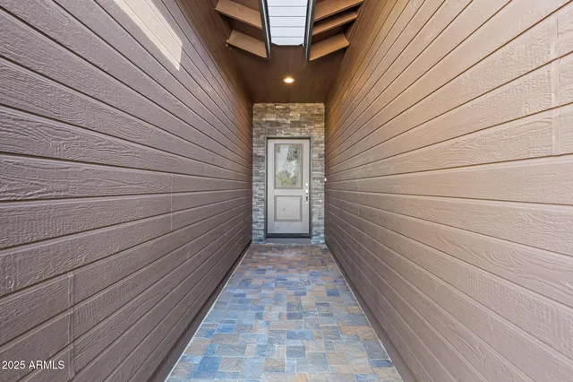 a front view of a house with a yard and porch