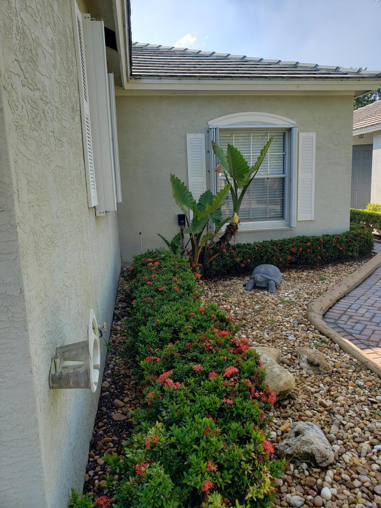 357 Southwest Coconut Key Way Port St. Lucie, FL 34986 - Photo 52 of 56 a house with a outdoor space