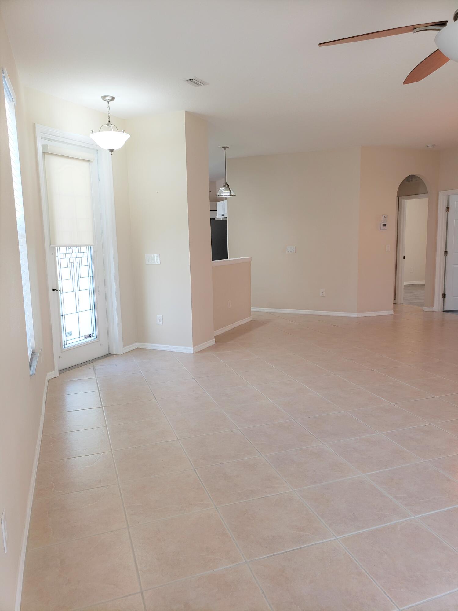 357 Southwest Coconut Key Way Port St. Lucie, FL 34986 - Photo 8 of 56 a view of a room that has a window