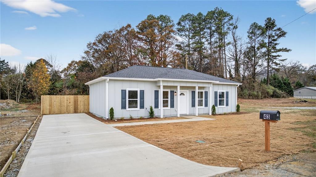 43 Brownlow Drive Northwest Rome, GA 30165 - Photo 2 of 24 a front view of a house with a yard