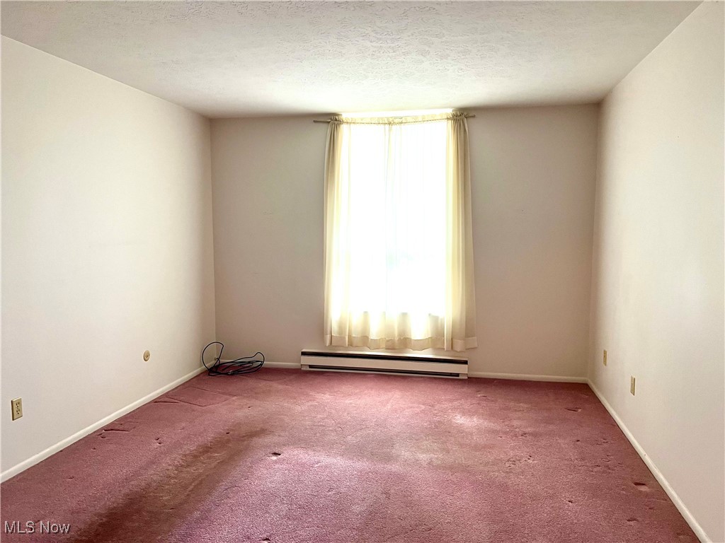3068 Kent Road, Unit 105C Stow, OH 44224 - Photo 11 of 42 Spacious primary bedroom