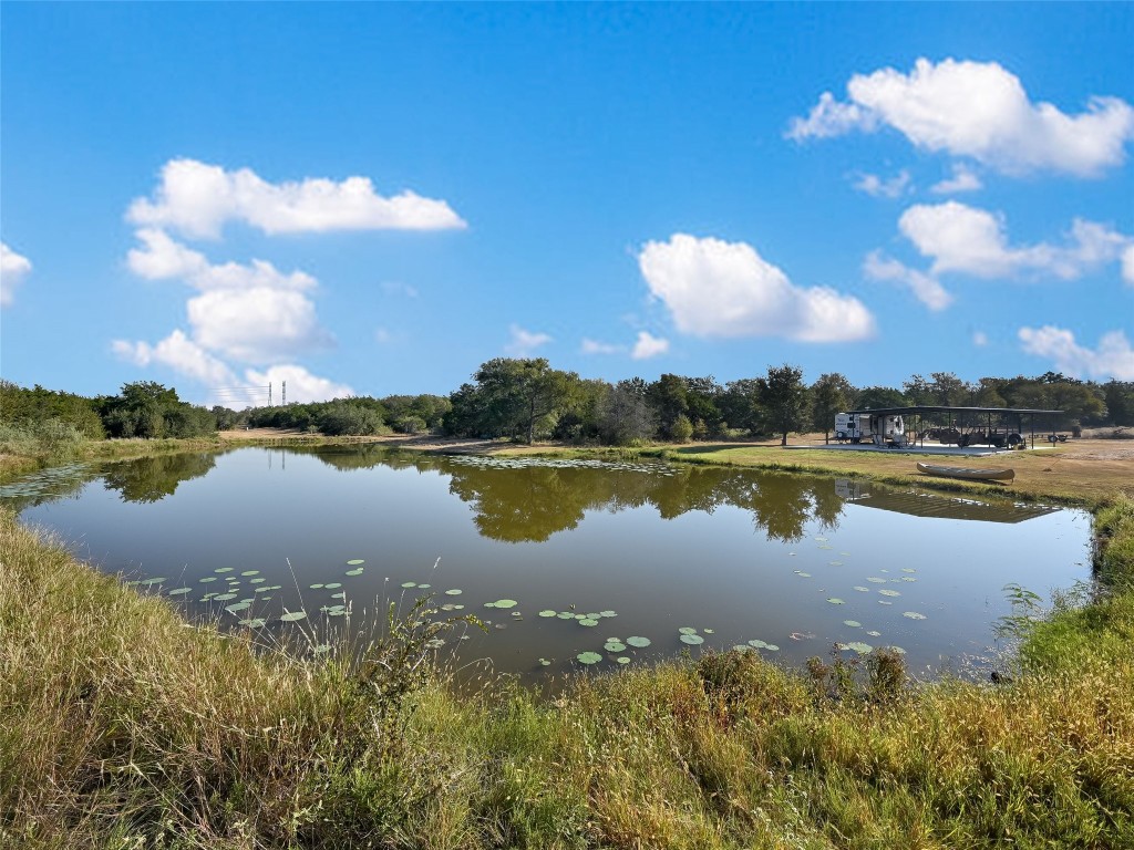 Tbd Tbd Karisch Road Giddings, TX 78942 - Photo 15 of 25 a view of a lake in between two and trees