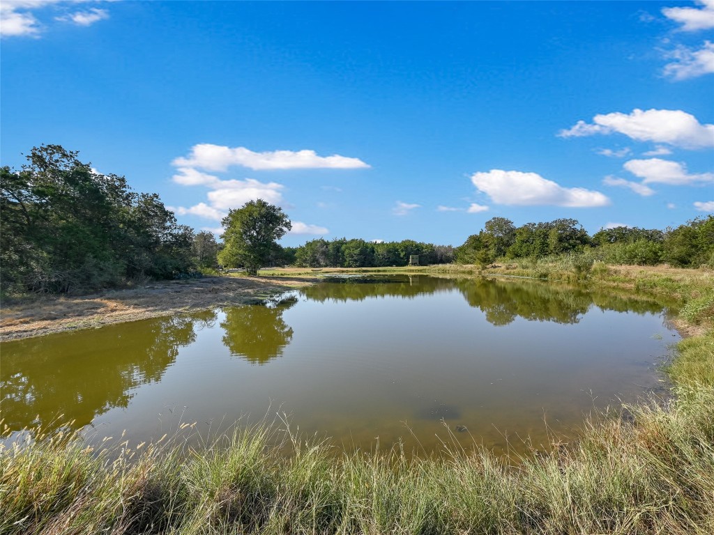 Tbd Tbd Karisch Road Giddings, TX 78942 - Photo 19 of 25 a view of a lake with houses in the background