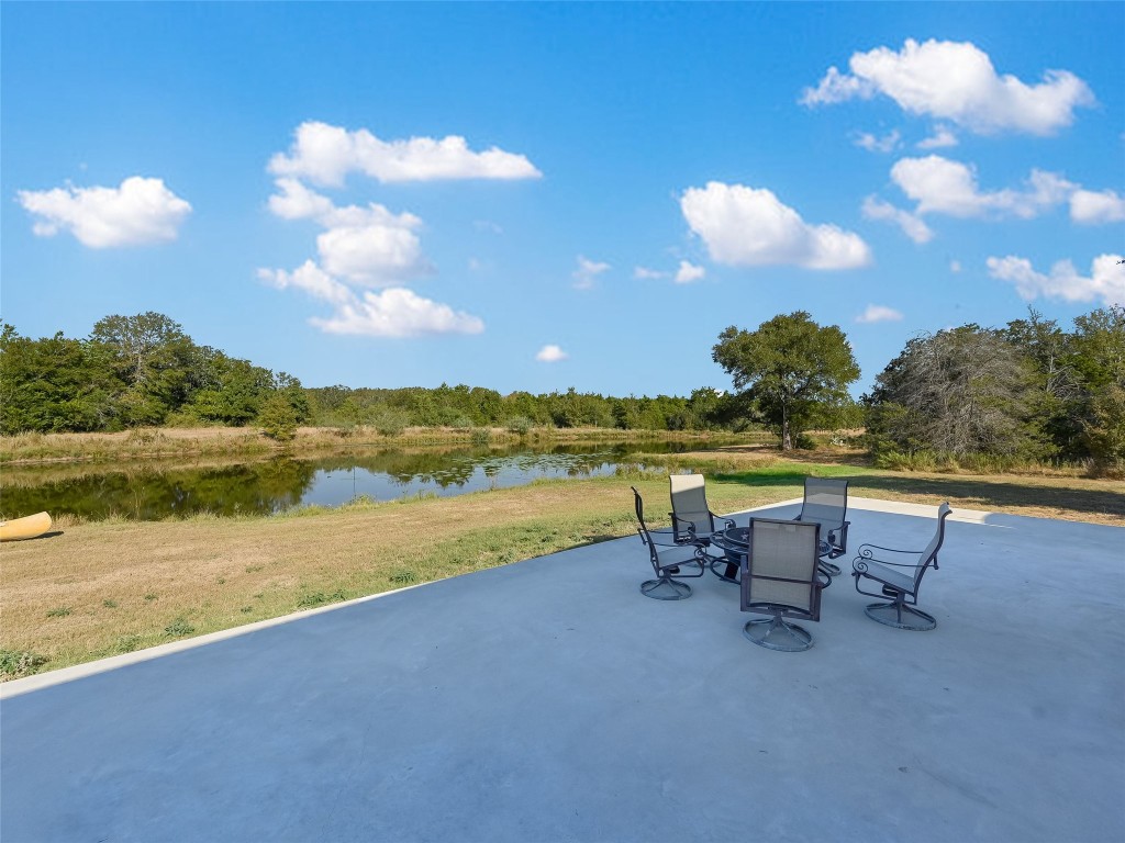 Tbd Tbd Karisch Road Giddings, TX 78942 - Photo 8 of 25 a view of lake with table and chairs