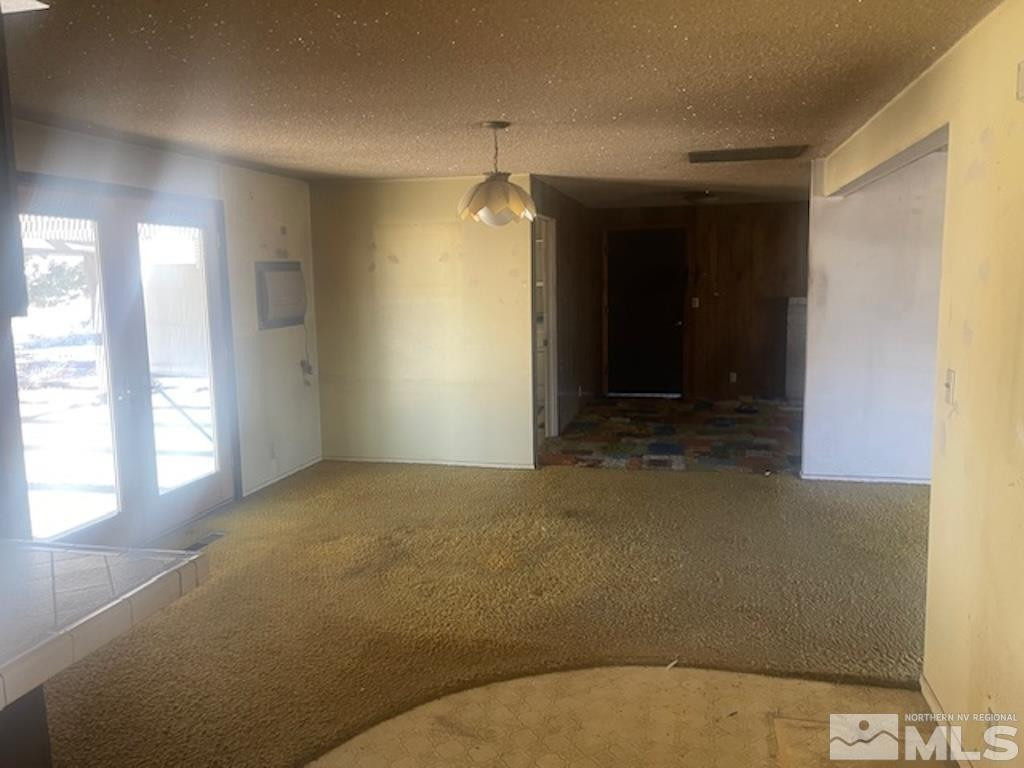 10765 Osage Road Reno, NV 89508 - Photo 16 of 22 a view of an empty room with a window
