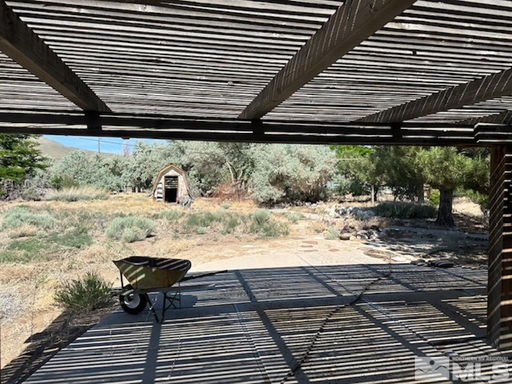 10765 Osage Road Reno, NV 89508 - Photo 5 of 22 a view of a backyard and a patio