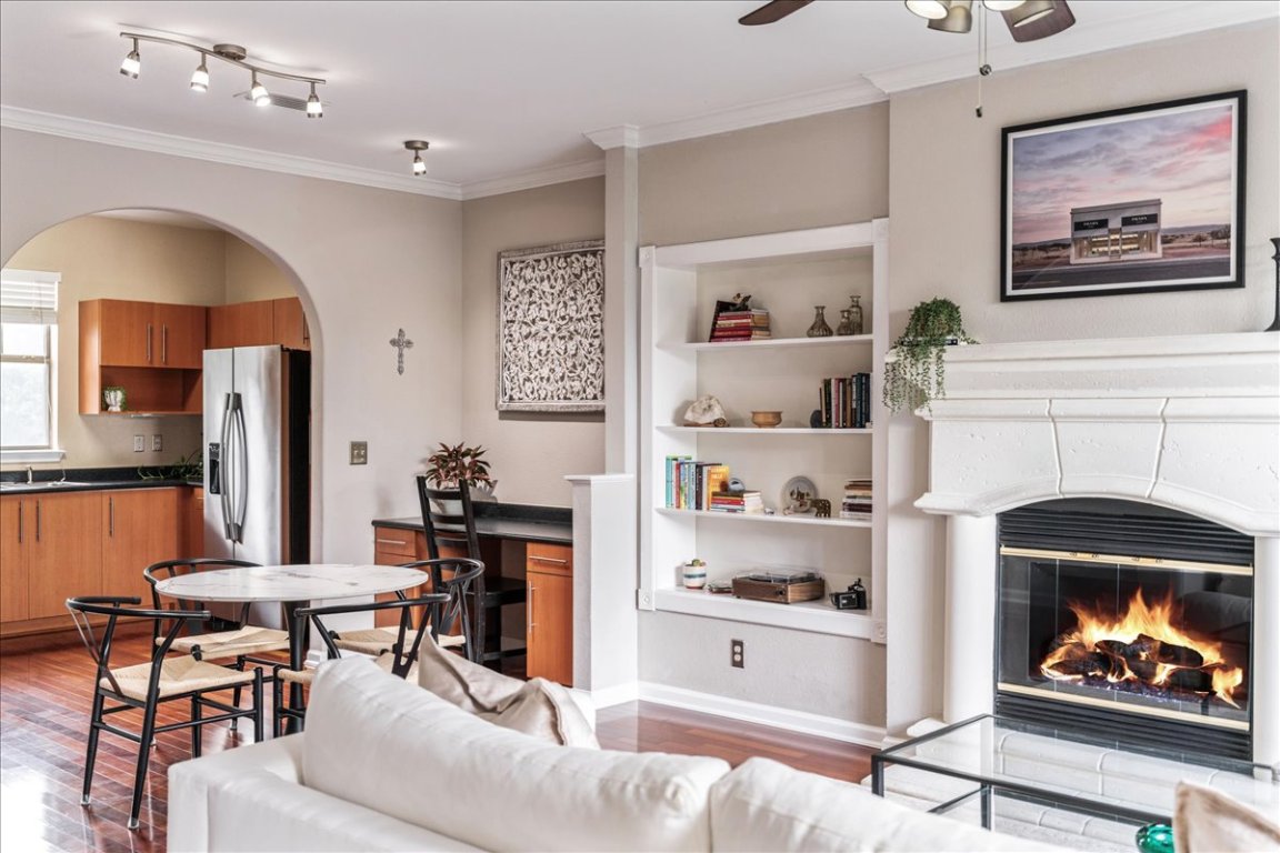 11203 Ranch Road 2222, Unit 1406 Austin, TX 78730 - Photo 18 of 37 a living room with furniture and a fireplace