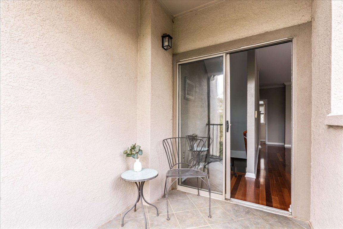 11203 Ranch Road 2222, Unit 1406 Austin, TX 78730 - Photo 20 of 37 a view of a hallway with furniture and front door