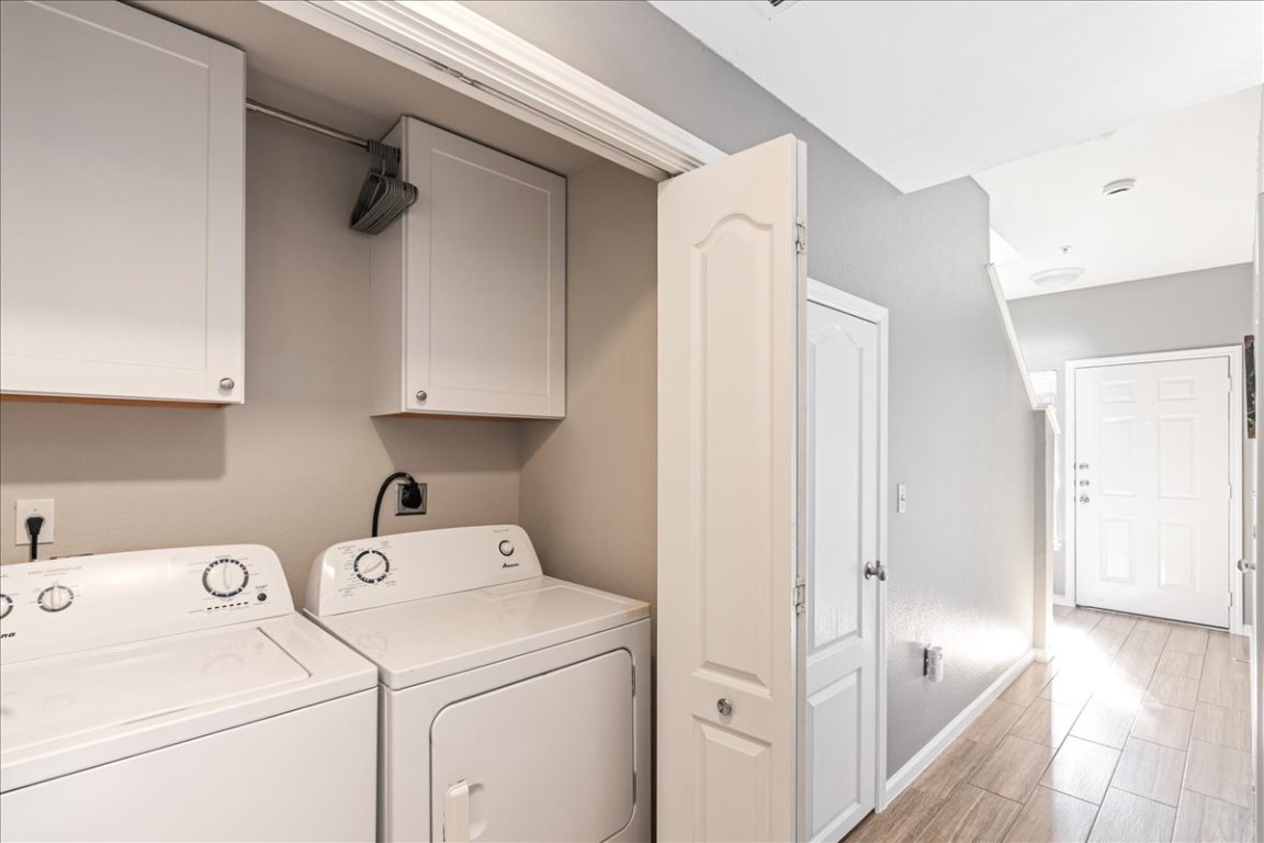 11203 Ranch Road 2222, Unit 1406 Austin, TX 78730 - Photo 24 of 37 a view of storage and utility room with washer and dryer