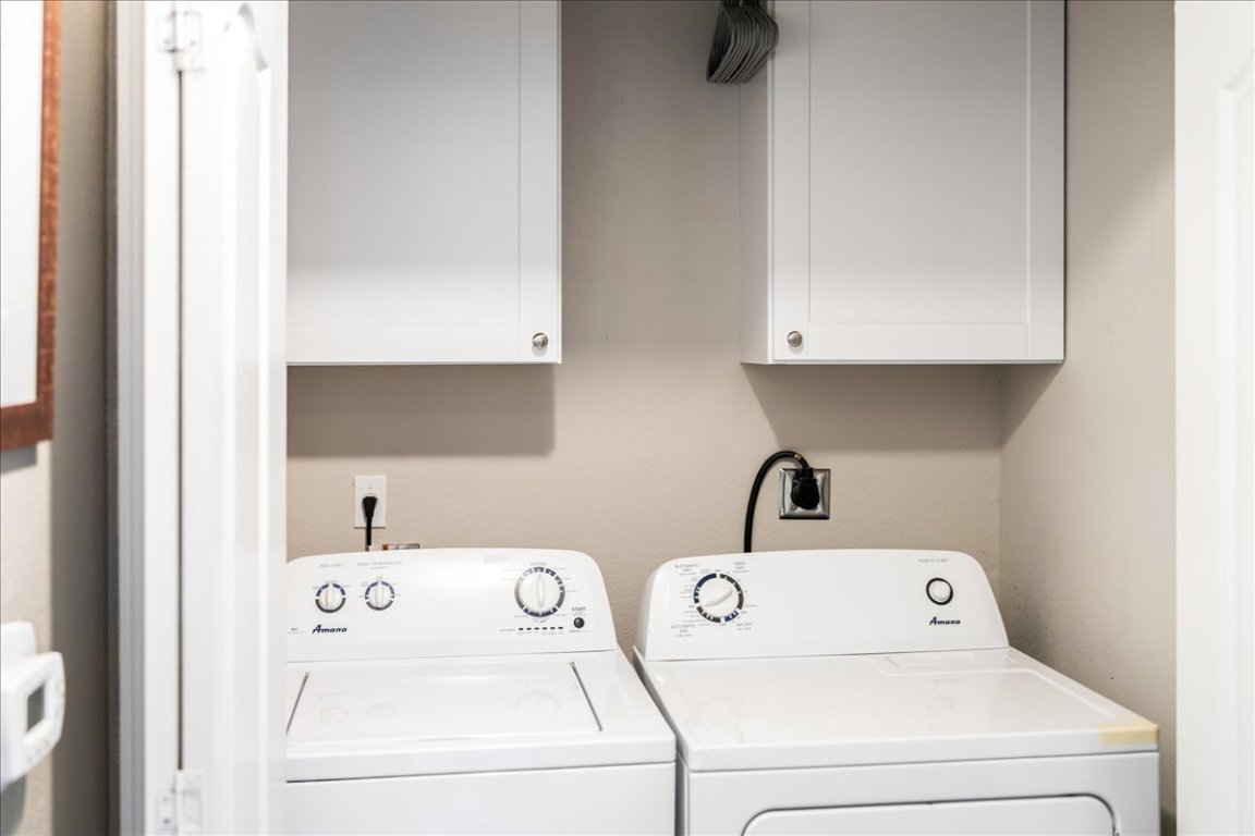 11203 Ranch Road 2222, Unit 1406 Austin, TX 78730 - Photo 25 of 37 a utility room with dryer and washer