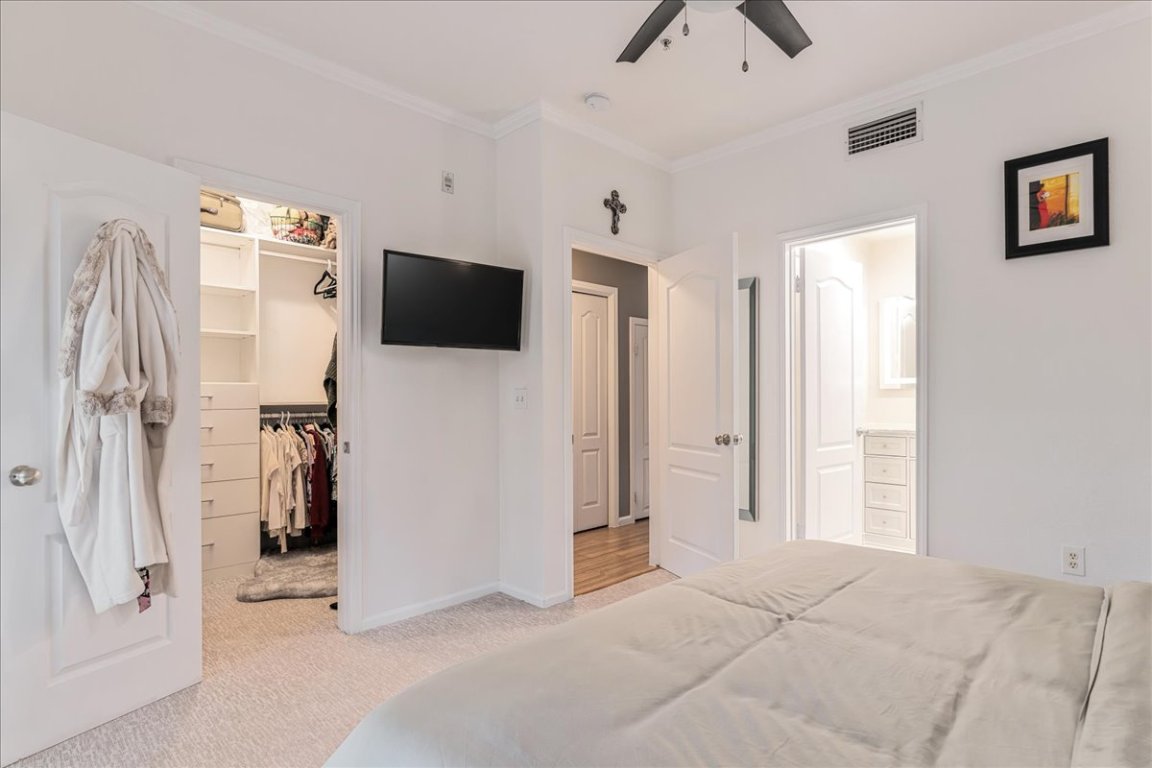 11203 Ranch Road 2222, Unit 1406 Austin, TX 78730 - Photo 29 of 37 a view of a livingroom with a flat screen tv