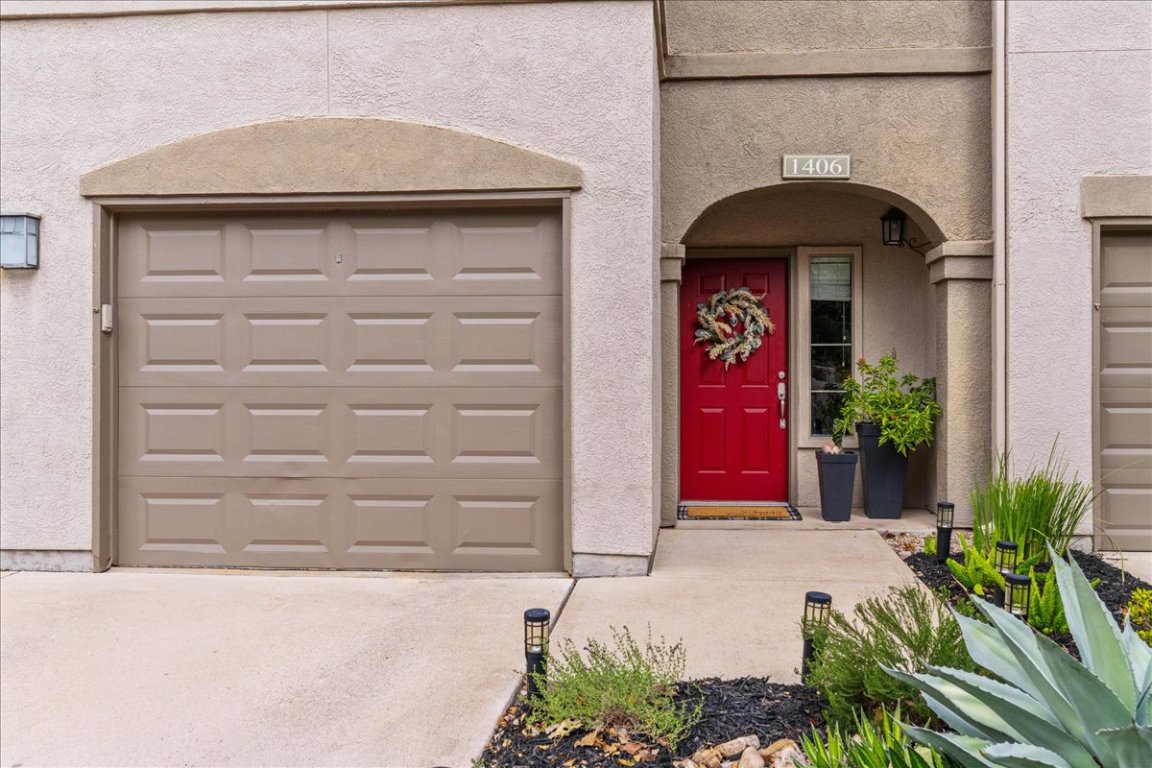 11203 Ranch Road 2222, Unit 1406 Austin, TX 78730 - Photo 36 of 37 a potted plant in front of a door