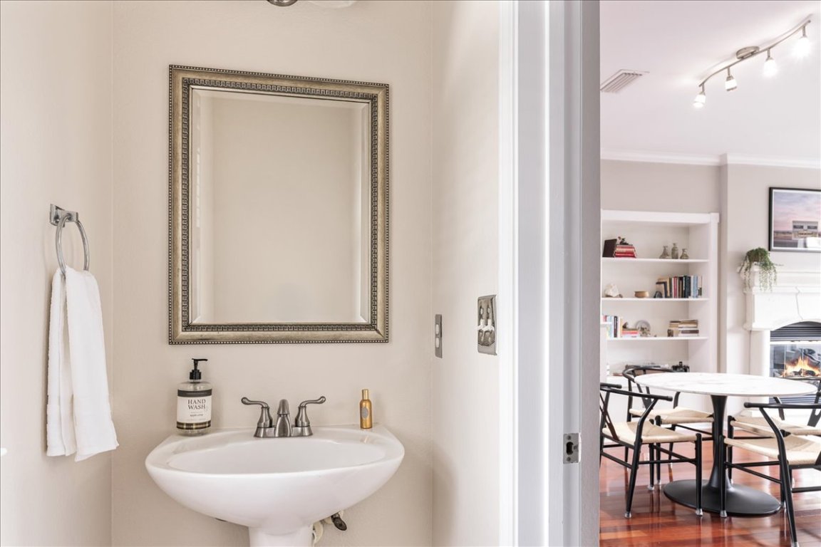 11203 Ranch Road 2222, Unit 1406 Austin, TX 78730 - Photo 8 of 37 a bathroom with a sink and a mirror