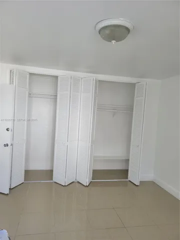 an empty room with closet