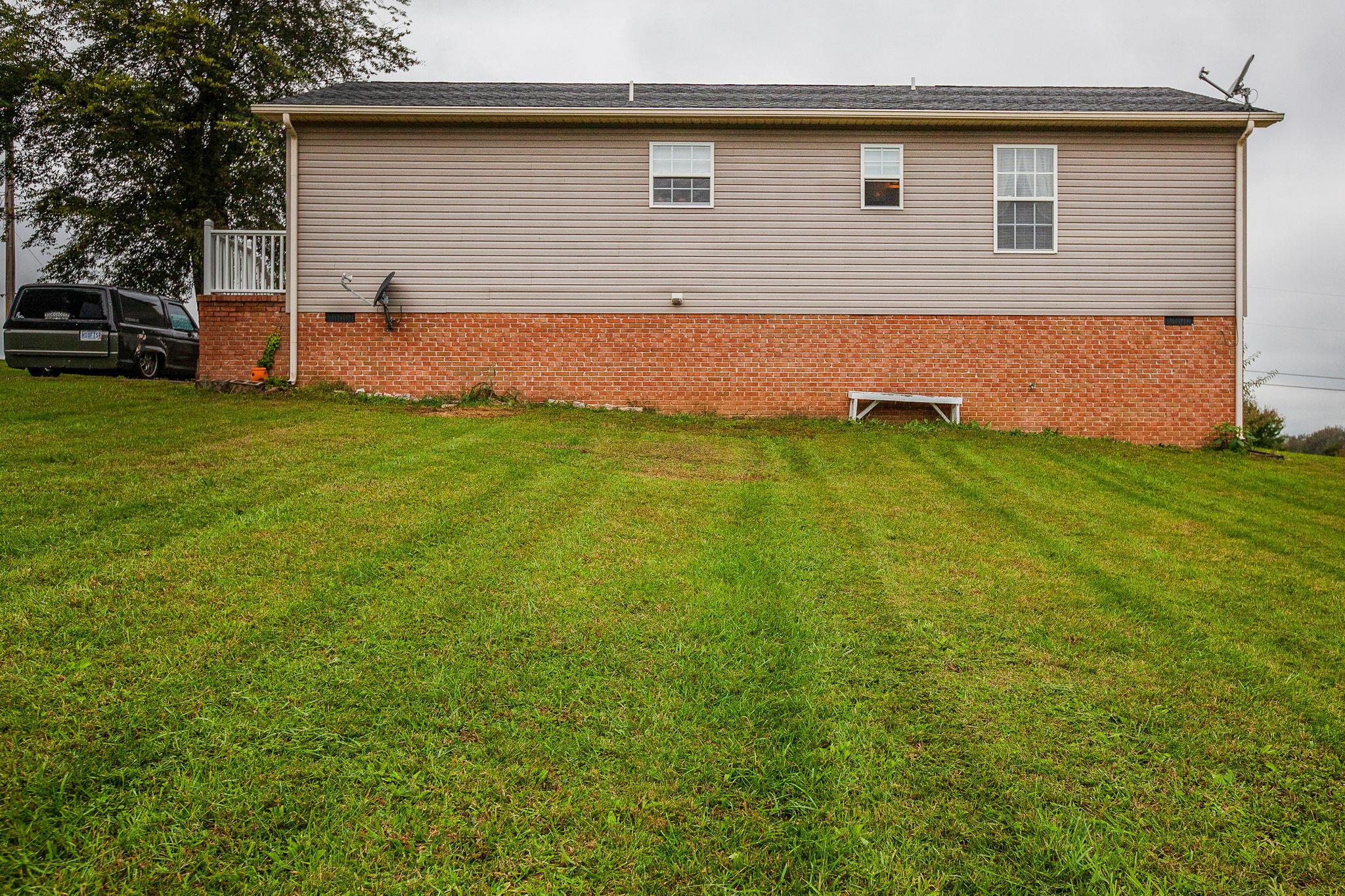 2005 Forest Ridge Trail Columbia, TN 38401 - Photo 23 of 26 Back yard with side porch next to the drivewayt