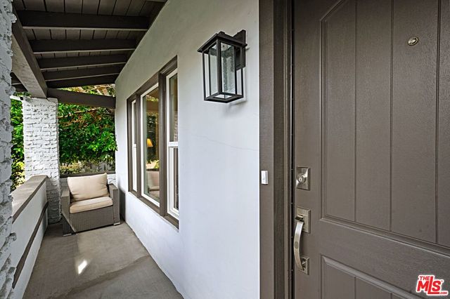 a view of living room furniture and entryway