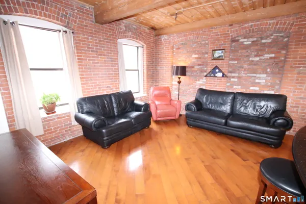 a living room with furniture and a couch