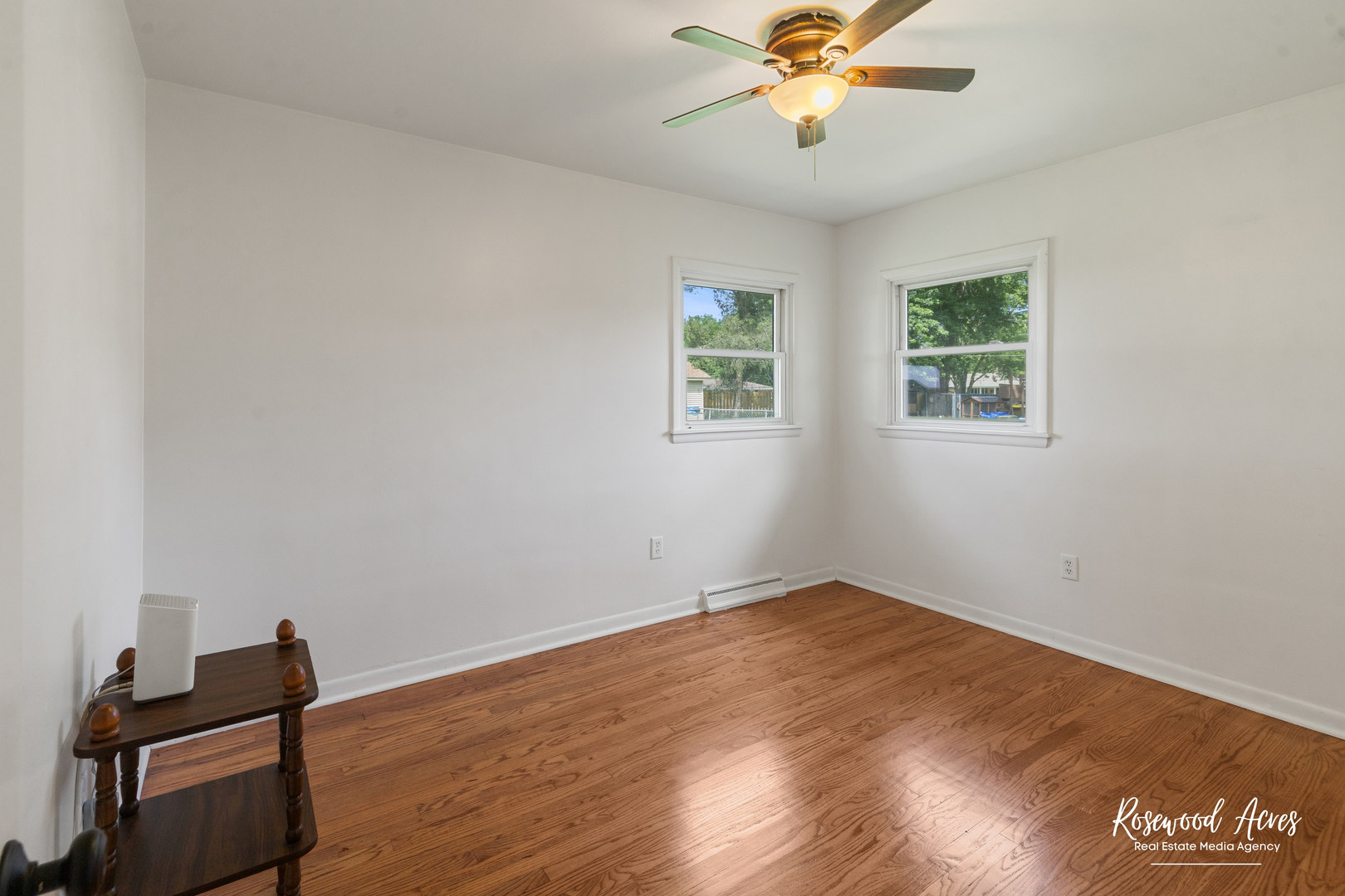 3090 River Road Kankakee, IL 60901 - Photo 14 of 22 a view of an empty room with window and wooden floor
