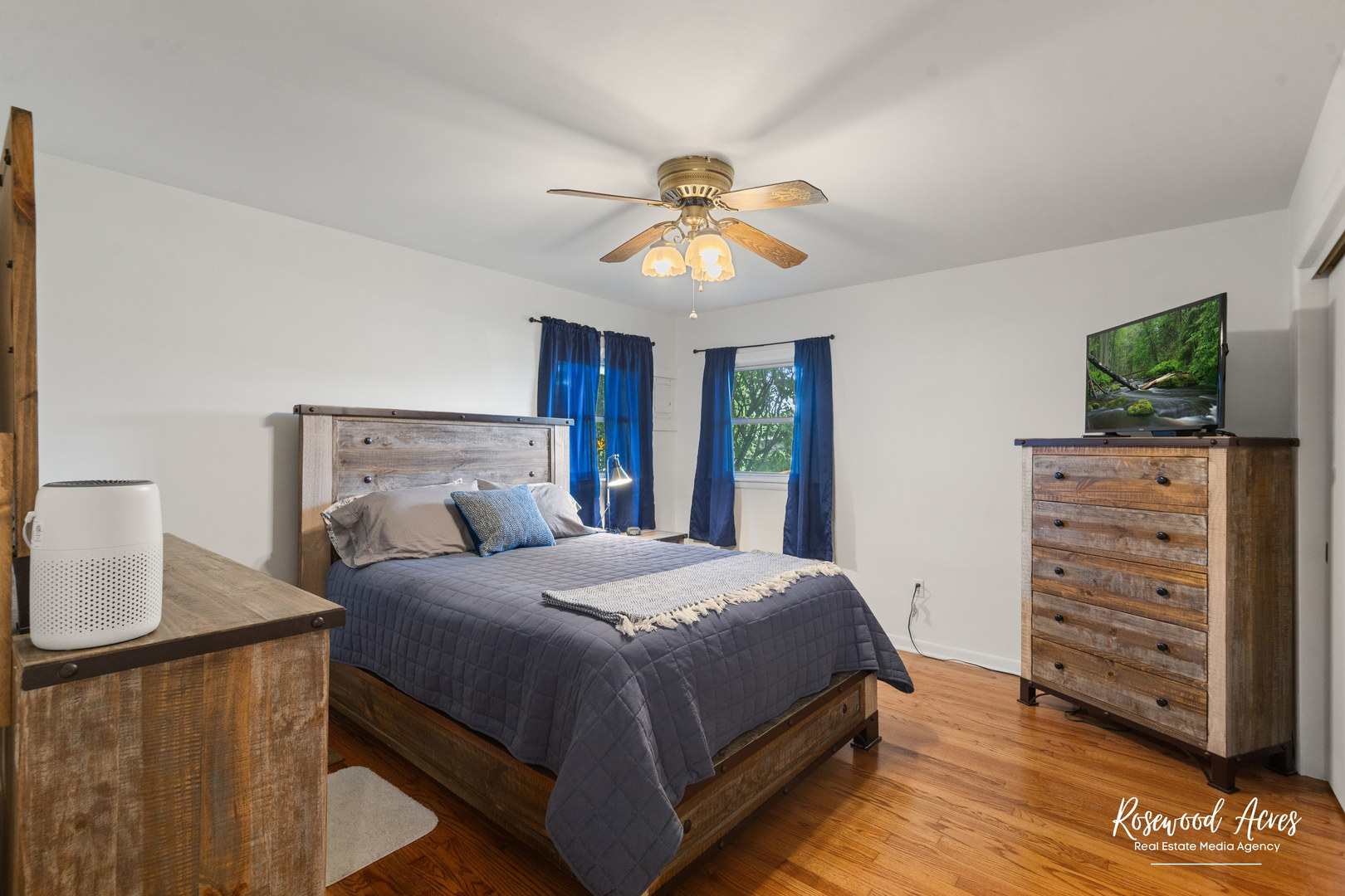 3090 River Road Kankakee, IL 60901 - Photo 10 of 22 a bedroom with a bed chandelier and a dresser