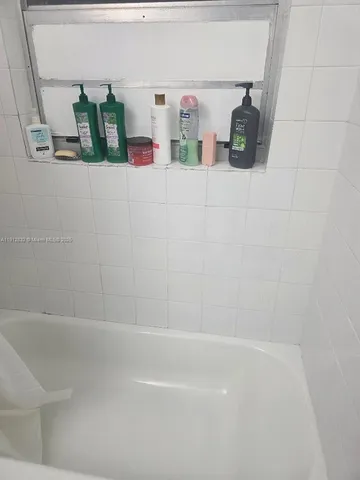 a close up of a bathtub