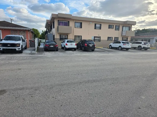 a car parked in front of a building