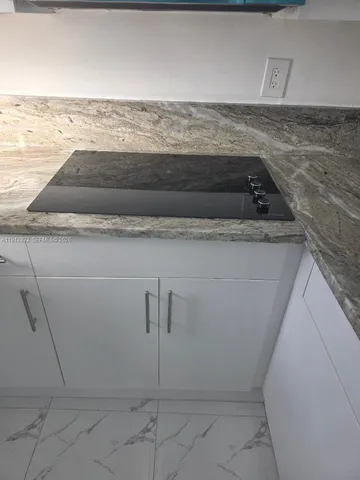 en empty room with windows