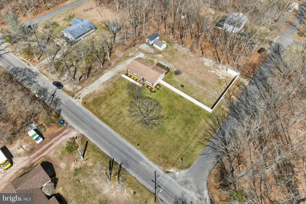 a view of swimming pool with seating area