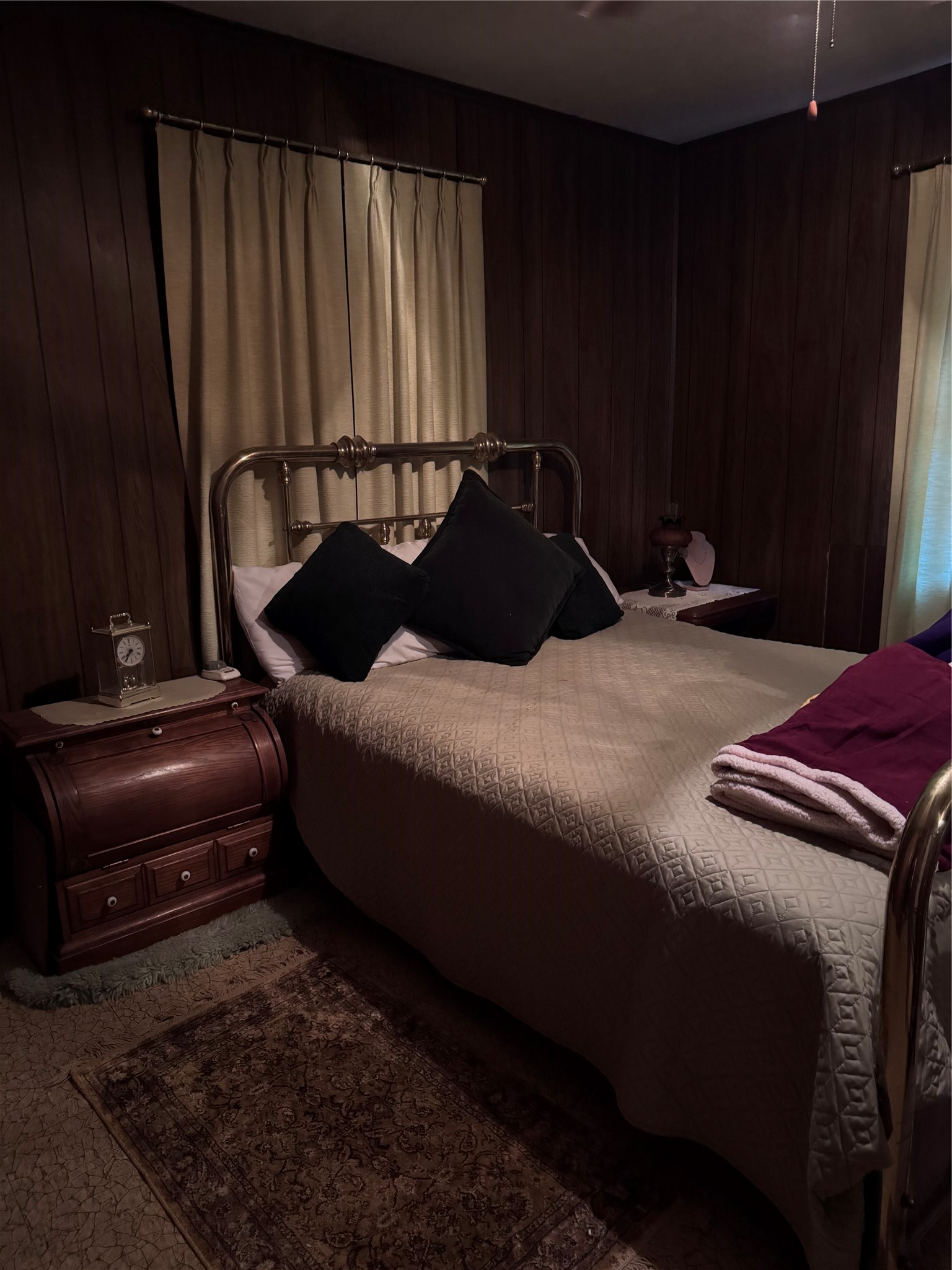 479 County Road Goodrich, TX 77335 - Photo 11 of 16 a bedroom with a bed lamp and a large window