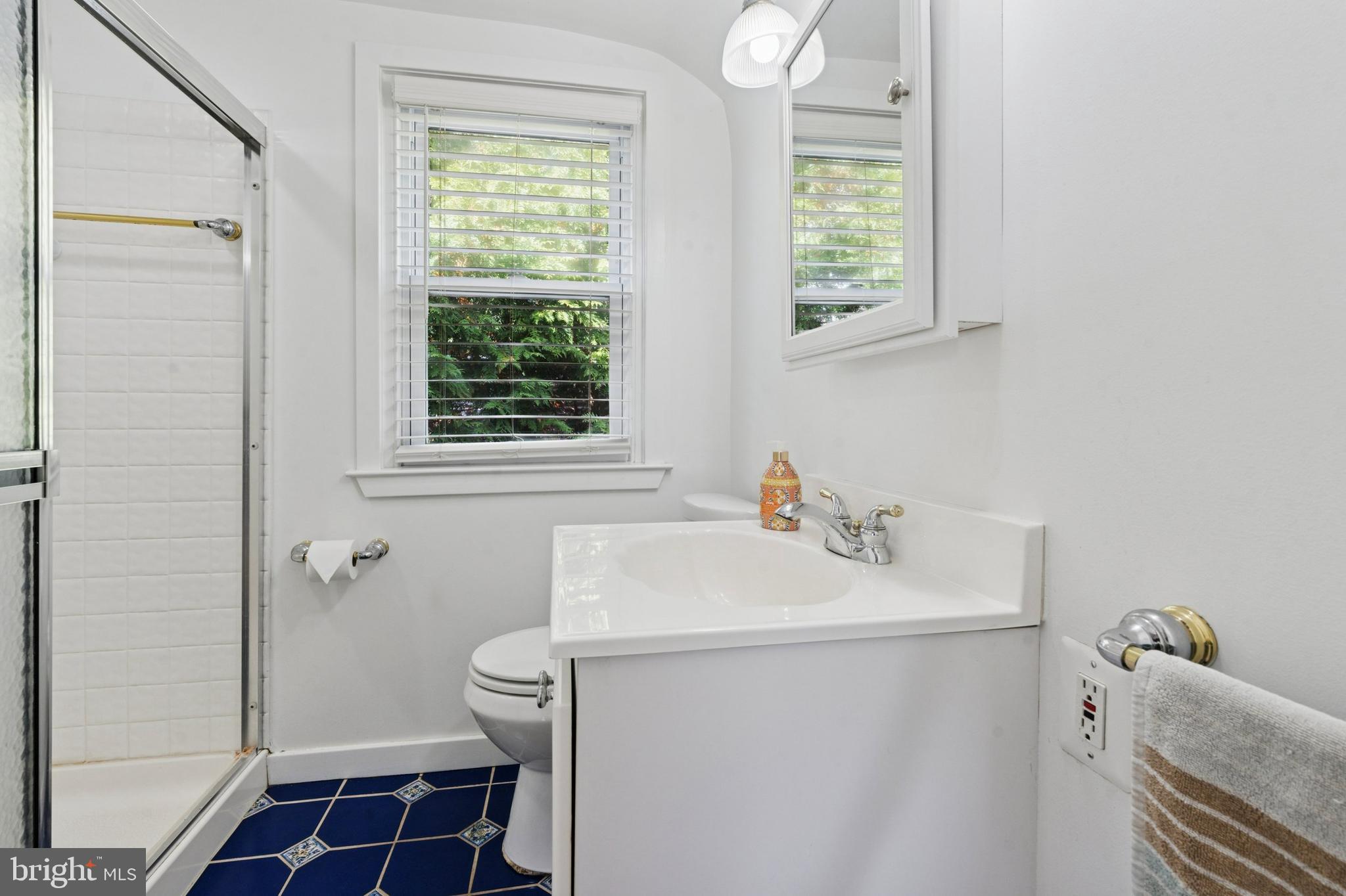 614 Wises Mill Road Philadelphia, PA 19128 - Photo 27 of 42 a bathroom with a sink toilet and shower