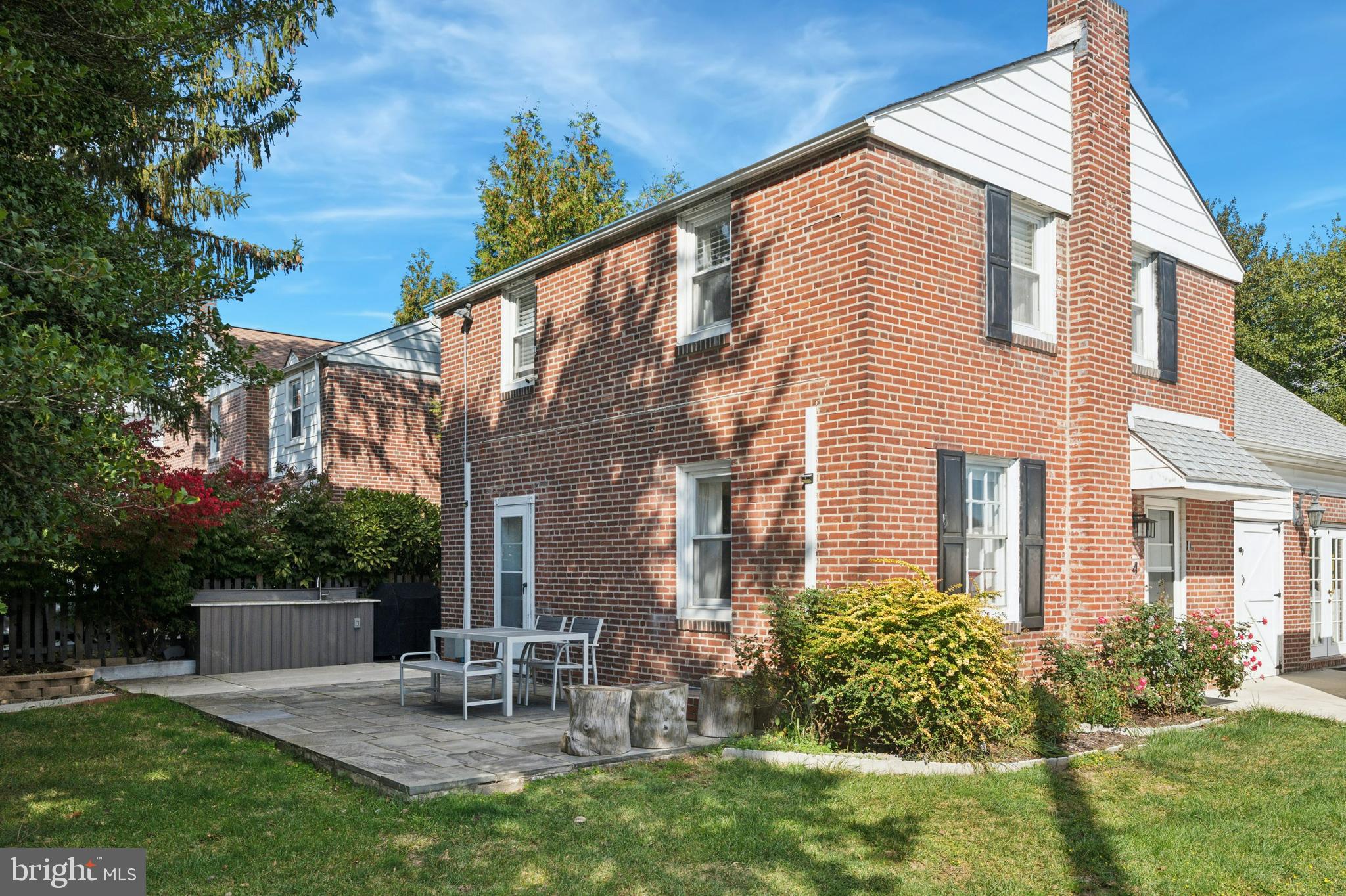 614 Wises Mill Road Philadelphia, PA 19128 - Photo 39 of 42 a view of a house with backyard and sitting area
