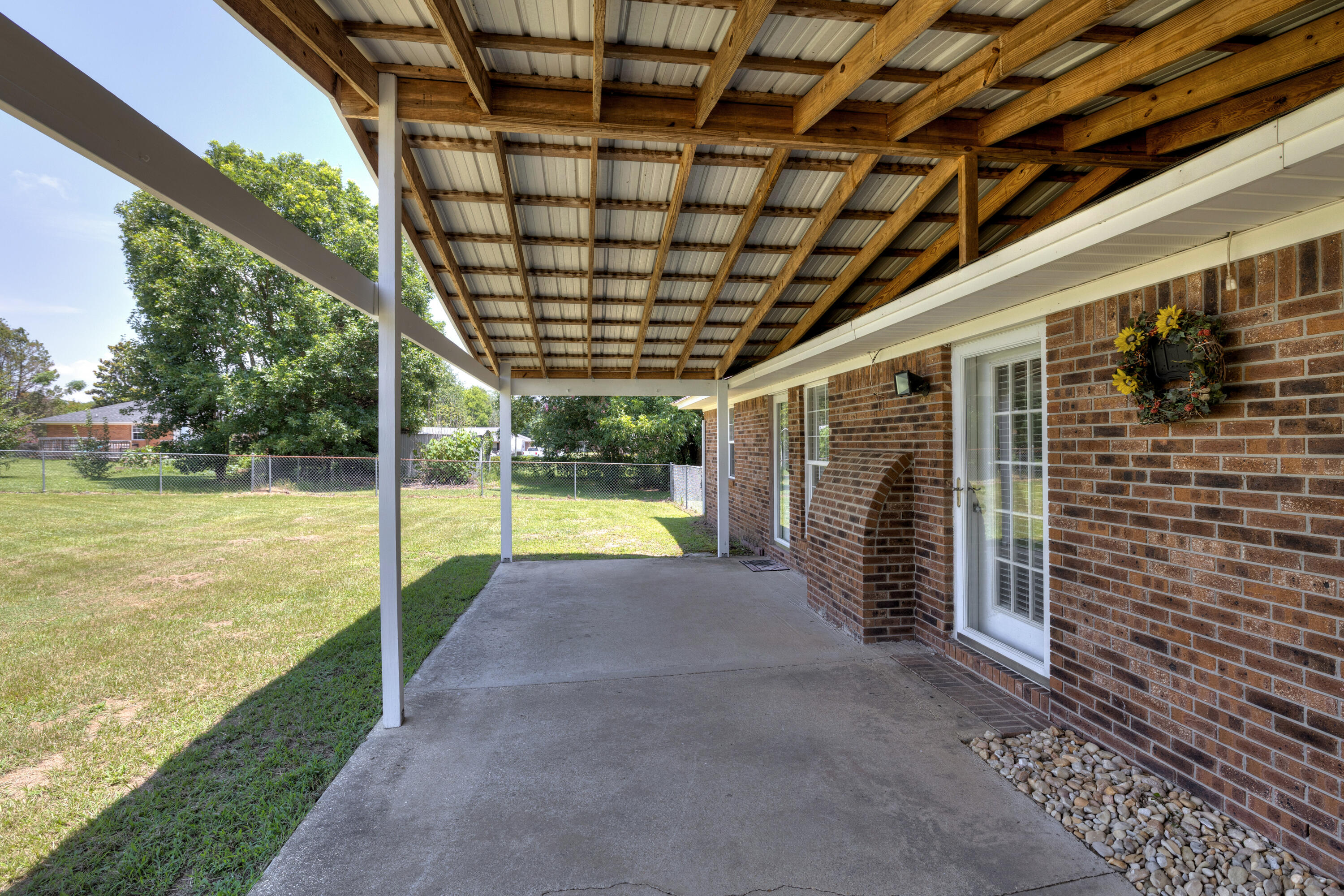 4915 Ridge Street Dalzell, SC 29040 - Photo 7 of 26 Large covered back porch the length of the house