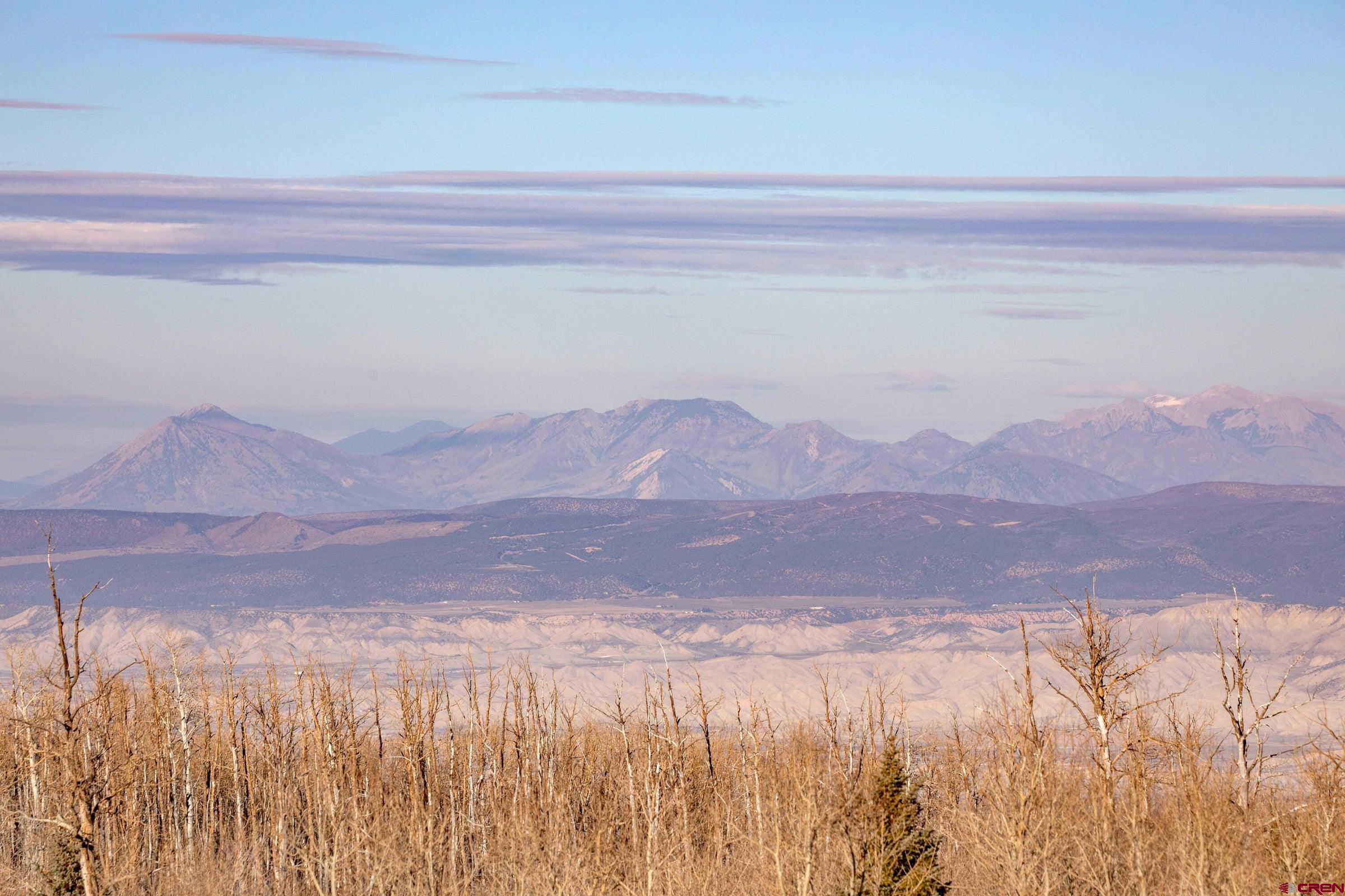 2 Cornerstone Trail Montrose, CO 81403 - Photo 9 of 16 a view of mountain with sunset in background