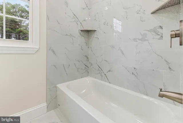 a bathroom with a bathtub