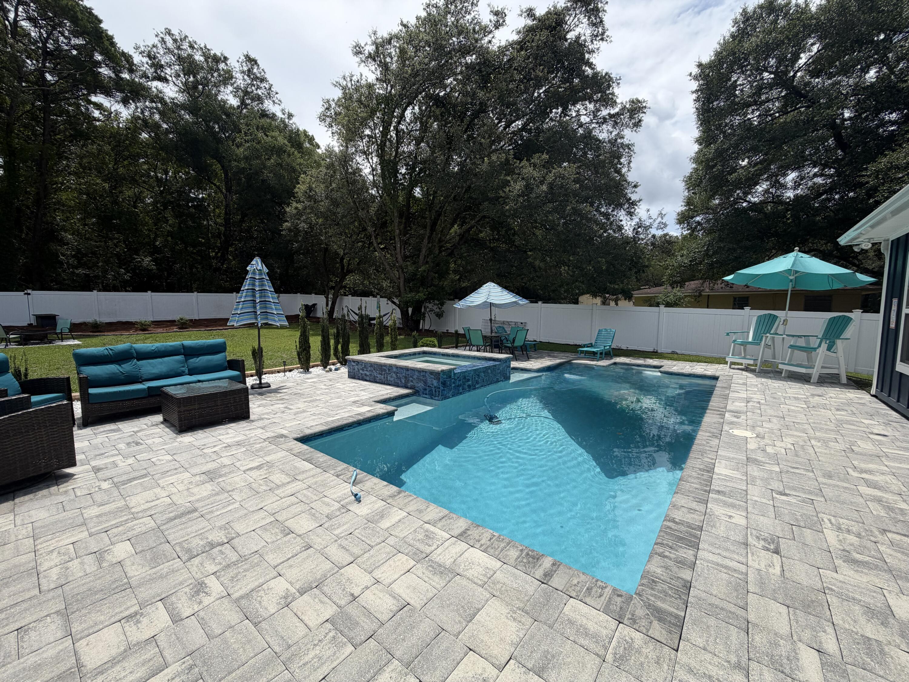 342 Eastern Street Freeport, FL 32439 - Photo 69 of 76 pool with new landscaping