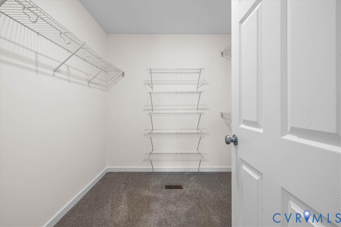 11325 Webb Road Disputanta, VA 23842 - Photo 13 of 32 a view of an empty walk in closet