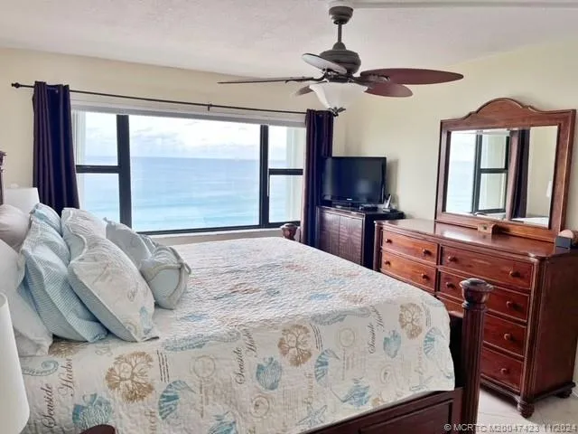 a bedroom with bed and window