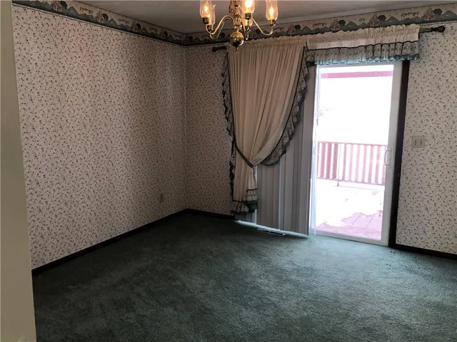 a balcony with wooden floor