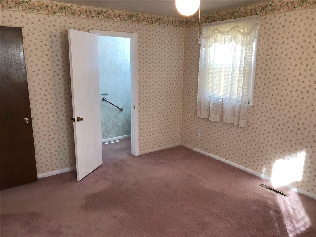 140 Redstone Furnace Road Hopwood, PA 15445 - Photo 20 of 38 an empty room with windows and closet