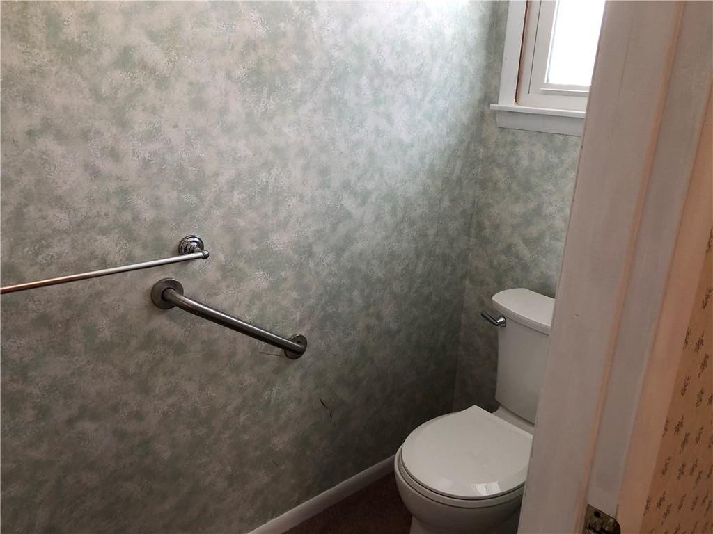 140 Redstone Furnace Road Hopwood, PA 15445 - Photo 21 of 38 a white toilet sitting next to a small window