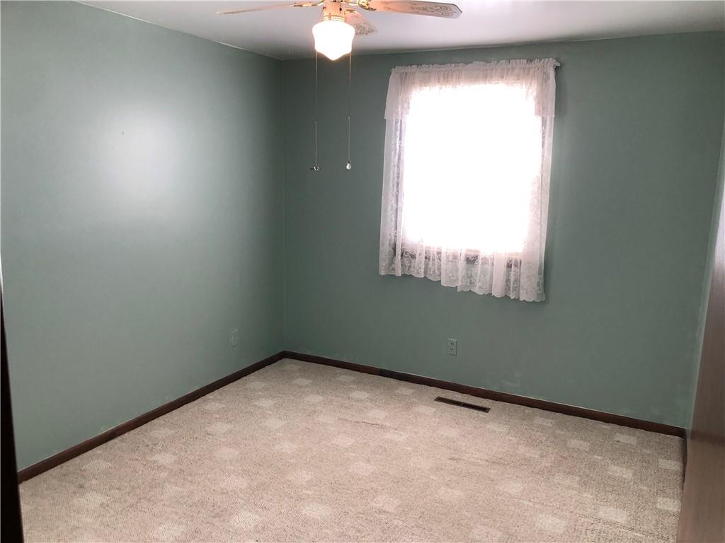 140 Redstone Furnace Road Hopwood, PA 15445 - Photo 23 of 38 an empty room with a window