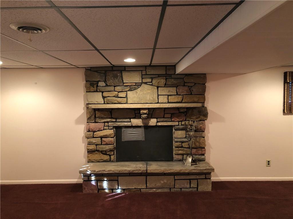 140 Redstone Furnace Road Hopwood, PA 15445 - Photo 28 of 38 a living room with furniture and a fireplace
