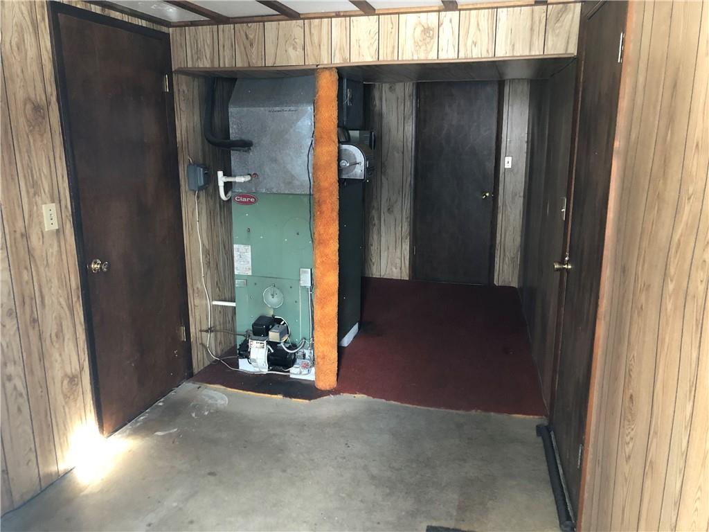 140 Redstone Furnace Road Hopwood, PA 15445 - Photo 34 of 38 a view of a room that has a bed and a window